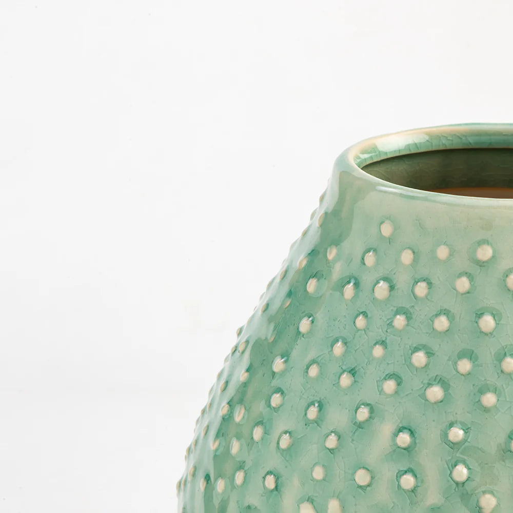 mint ceramic vase a highlight of the styling space