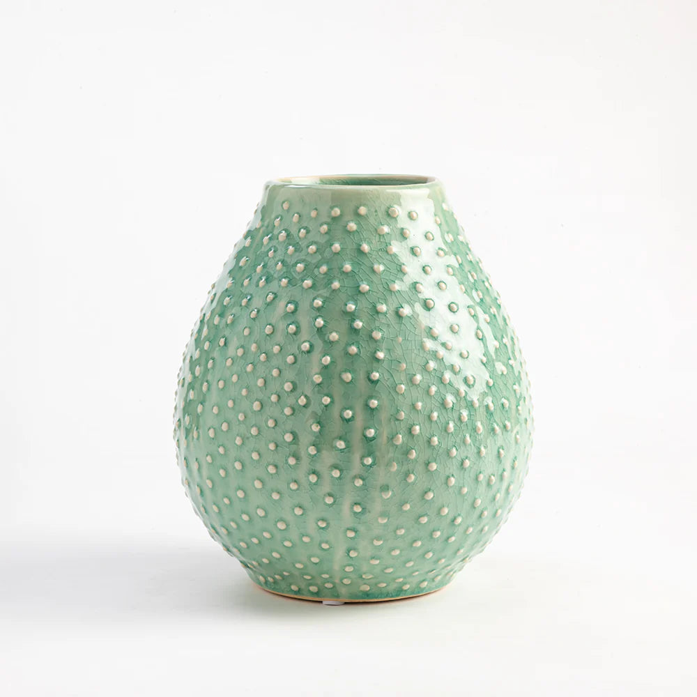 Mint green colour ceramic vase to be styled elegantly