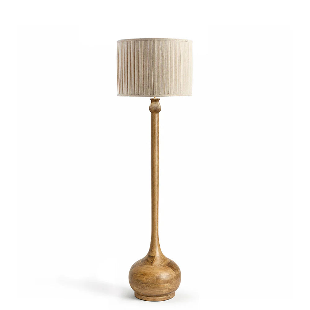 Floor lamp with wooden base and beige pleated shade on a white background